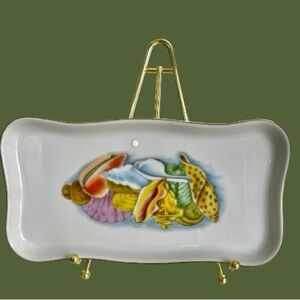 Small ceramic tray, with a wonderful seashell illustration,cute in a powder room